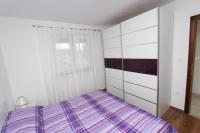 Posteľ alebo postele v izbe v ubytovaní Apartments Dujmović