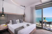 Posteľ alebo postele v izbe v ubytovaní Stelakis Beach