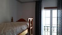 Posteľ alebo postele v izbe v ubytovaní Apartamentos Timón Puerto
