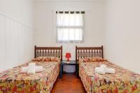 A bed or beds in a room at La Quinta Punyeta