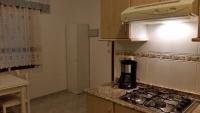 Kuchyňa alebo kuchynka v ubytovaní Apartamentos Timón Puerto