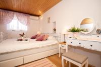 Posteľ alebo postele v izbe v ubytovaní Apartman Verbenia