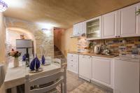 Kuchyňa alebo kuchynka v ubytovaní Apartman Verbenia