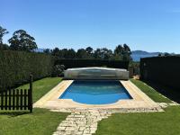 The swimming pool at or close to Beautiful house in Cangas near the beach