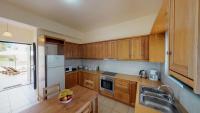 Kuchyň nebo kuchyňský kout v ubytování Villa Athina