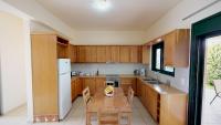 Kuchyň nebo kuchyňský kout v ubytování Villa Athina