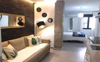 Posteľ alebo postele v izbe v ubytovaní Apartamentos Villa Serali Parking Gratis