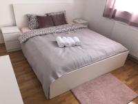 Postel nebo postele na pokoji v ubytování Apartman STAR