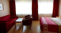 Postel nebo postele na pokoji v ubytování Fosshotel Rauðará