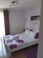 Posteľ alebo postele v izbe v ubytovaní Guest House Mačić