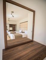 Postel nebo postele na pokoji v ubytování Letna Garden Suites