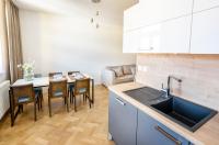 Kuchyň nebo kuchyňský kout v ubytování Letna Garden Suites