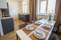 Kuchyň nebo kuchyňský kout v ubytování Letna Garden Suites