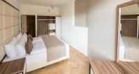 Postel nebo postele na pokoji v ubytování Letna Garden Suites