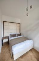 Postel nebo postele na pokoji v ubytování Letna Garden Suites
