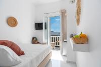 Posteľ alebo postele v izbe v ubytovaní Central Suites Mykonos