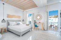 Posteľ alebo postele v izbe v ubytovaní Central Suites Mykonos