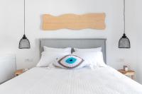 Posteľ alebo postele v izbe v ubytovaní Central Suites Mykonos