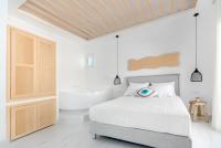 Posteľ alebo postele v izbe v ubytovaní Central Suites Mykonos