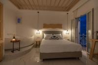 Posteľ alebo postele v izbe v ubytovaní Central Suites Mykonos