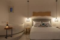 Posteľ alebo postele v izbe v ubytovaní Central Suites Mykonos