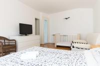 Postel nebo postele na pokoji v ubytování Villa Valica