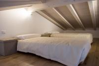 Posteľ alebo postele v izbe v ubytovaní Home Suites Home