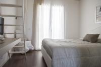 Posteľ alebo postele v izbe v ubytovaní Home Suites Home