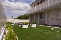 Vonkajšia záhrada v ubytovaní Home Suites Home