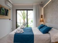 Postel nebo postele na pokoji v ubytování Marinos Beach Hotel
