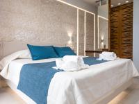 Postel nebo postele na pokoji v ubytování Marinos Beach Hotel