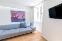 Televízia a/alebo spoločenská miestnosť v ubytovaní Seaview Apartments Baska