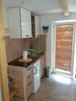 Kuchyňa alebo kuchynka v ubytovaní Apartment Mir