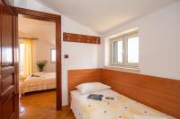 Posteľ alebo postele v izbe v ubytovaní Villa Sveta Eufemija Bed end Breakfast I