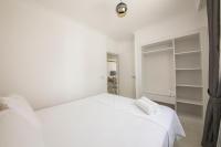Postel nebo postele na pokoji v ubytování Cedrus Suites