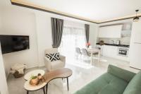 Kuchyň nebo kuchyňský kout v ubytování Cedrus Suites
