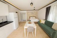 Kuchyň nebo kuchyňský kout v ubytování Cedrus Suites