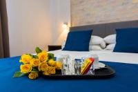 A bed or beds in a room at Rent Rooms Trastevere
