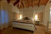 Postel nebo postele na pokoji v ubytování Agriturismo Villa Trovatore