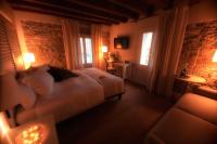 Postel nebo postele na pokoji v ubytování Agriturismo Villa Trovatore