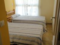 Postel nebo postele na pokoji v ubytování Urbanización Sueños de Denia II bajo