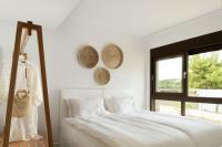 Posteľ alebo postele v izbe v ubytovaní Amantes Villas and Suites