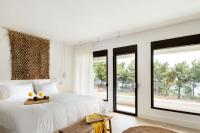 Posteľ alebo postele v izbe v ubytovaní Amantes Villas and Suites