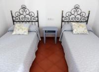 A bed or beds in a room at Agroturismo Son Triay