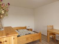 Postel nebo postele na pokoji v ubytování Apartmány Turold Mikulov