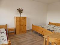 Postel nebo postele na pokoji v ubytování Apartmány Turold Mikulov