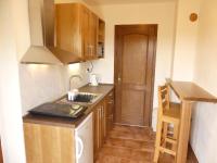 Kuchyň nebo kuchyňský kout v ubytování Apartmány Turold Mikulov