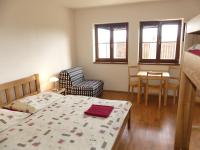 Postel nebo postele na pokoji v ubytování Apartmány Turold Mikulov