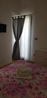Posteľ alebo postele v izbe v ubytovaní Manganelli Home