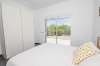 A bed or beds in a room at Cubo's Villa Dreams
